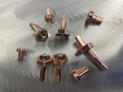 Aluminum bronze ball and socket assemblies.