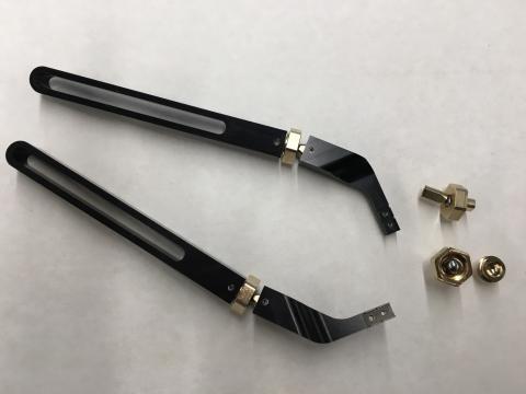 Anodized aluminum arms with ball socket joints.