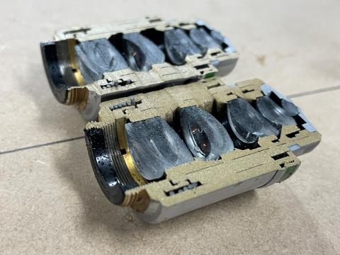 A microscope lens cut in half using the waterjet.