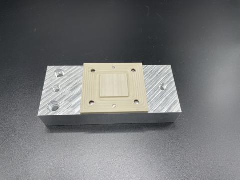 A magnetic mount for laser applications.