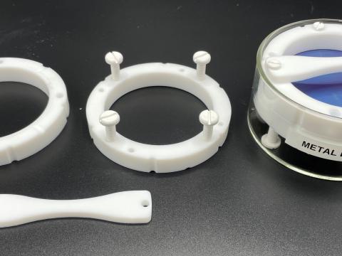 A silicon wafer cleaning device made from teflon.
