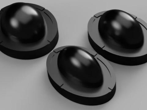Delrin molds for silicone measuring the axial load on egg shell geometries.
